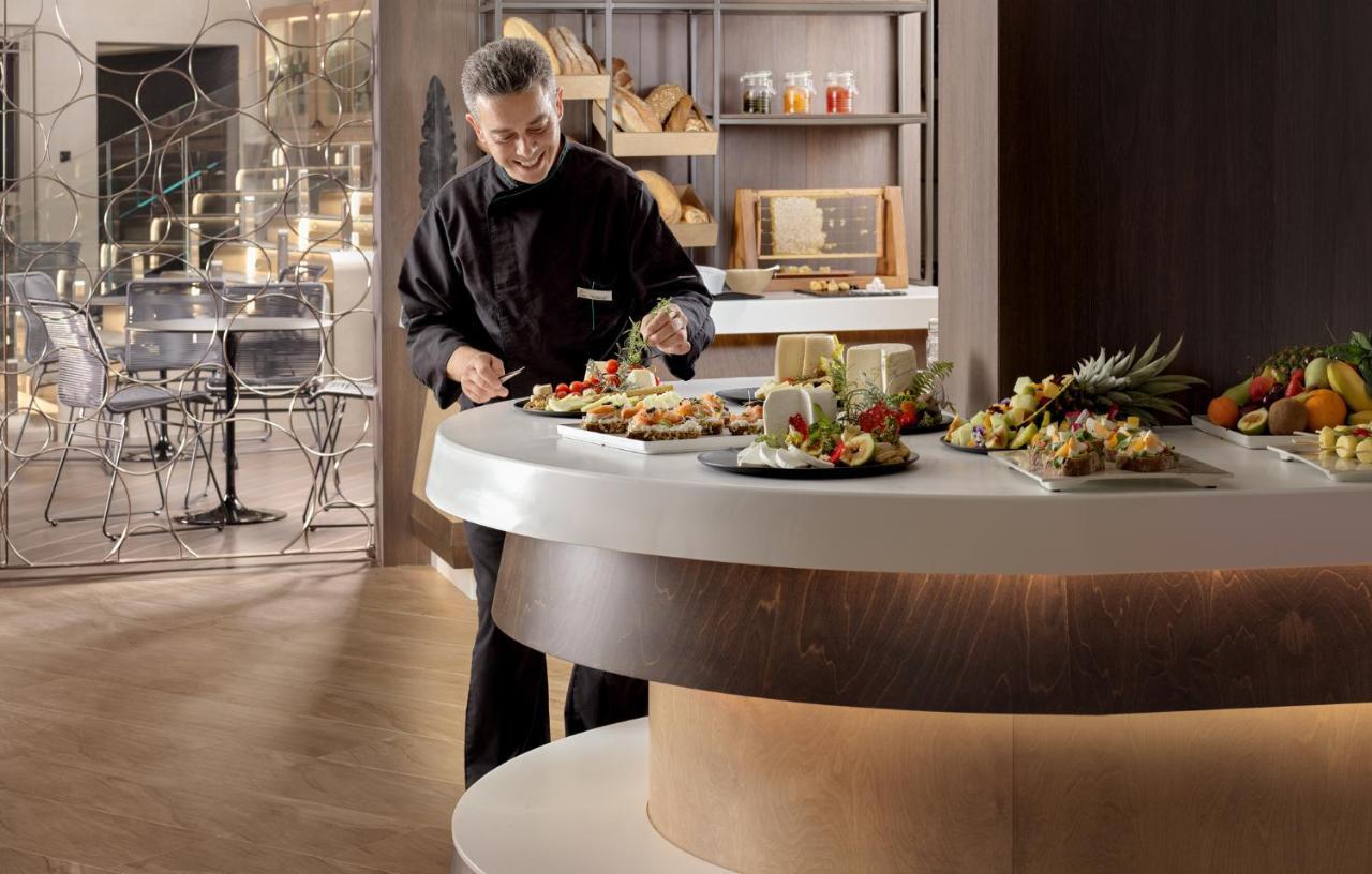Nautilux Rethymno By Mage Hotels Exterior photo A chef at work